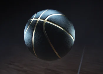 bola de basquete preta com listras douradas