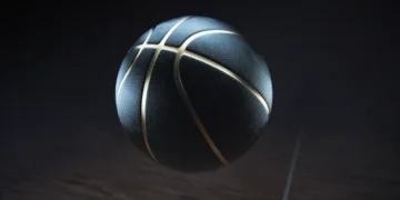 bola de basquete preta com listras douradas